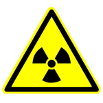 Symbolen för radioaktivitet på en trekantig varningsskylt.